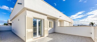 Appartement 'Stella Marina' met privéterras, draadloos internet en airconditioning
