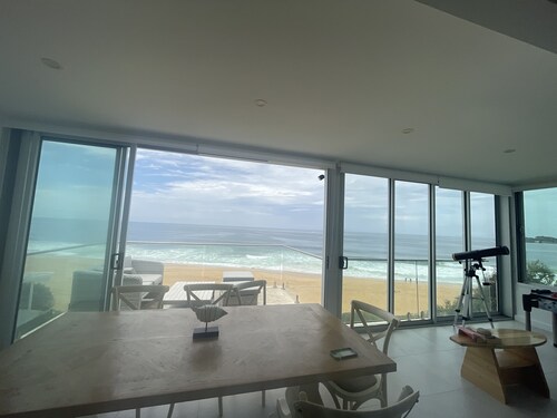 17 steps-newly renovated  penthouse apartment on wamberal beach.180degree views 