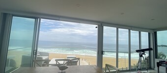 17 steps-newly renovated penthouse apartment on wamberal beach.180degree views