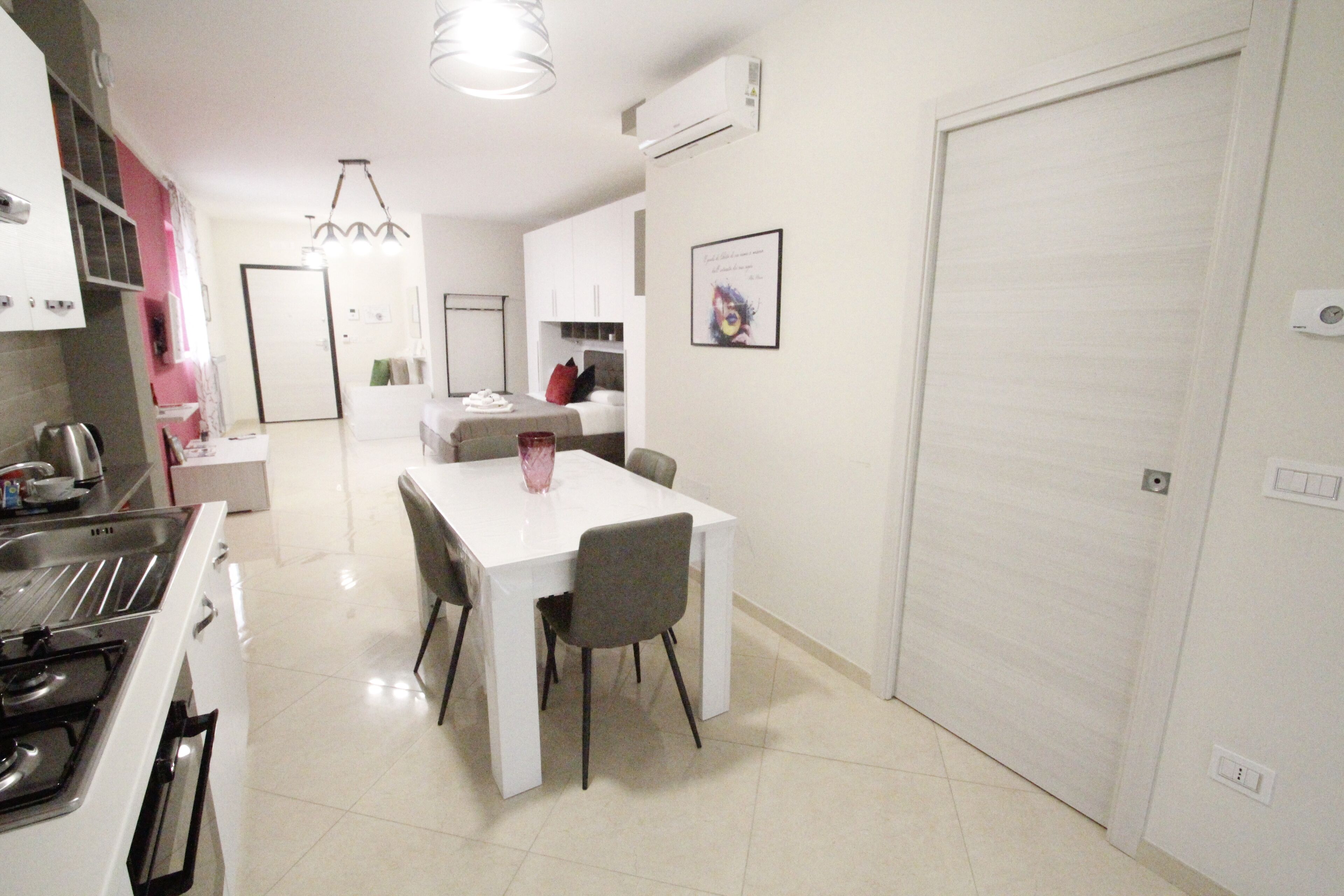 Phòng 4 dành cho gia đình, 1 phòng ngủ, quang cảnh thành phố | Khu vực ăn uống tại phòng