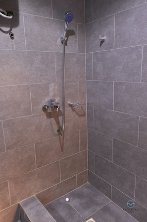 Shower, eco-friendly toiletries, hair dryer, towels