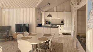 Un espace de vie moderne, ouvert et décloisonné, comprenant un coin repas, une cuisine et un espace détente.