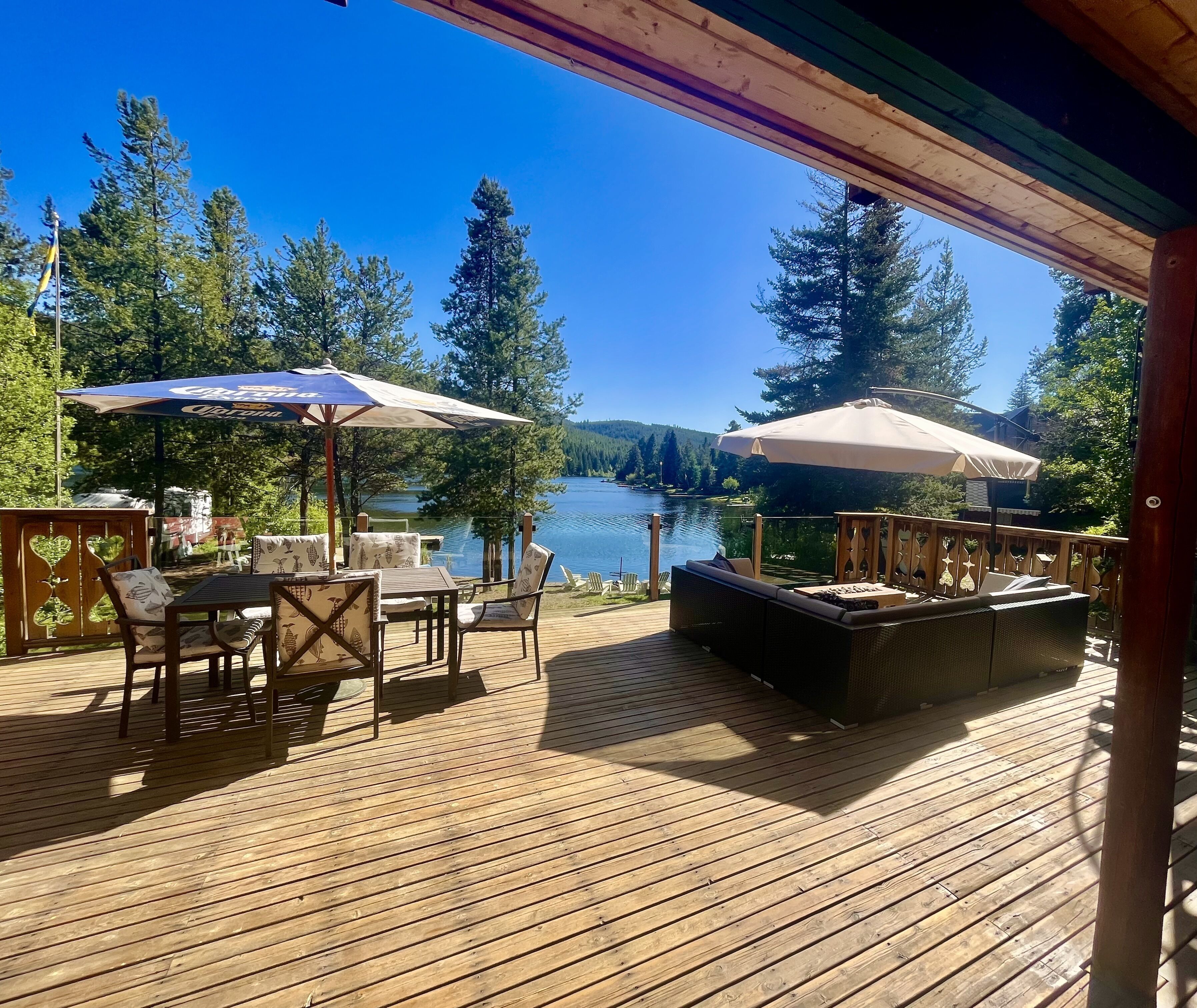 Lower patio with shaded table to dine al fresco.