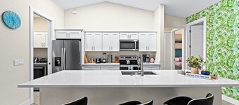 Sunshine Palm Oasis with Heated Pool and Bikes
