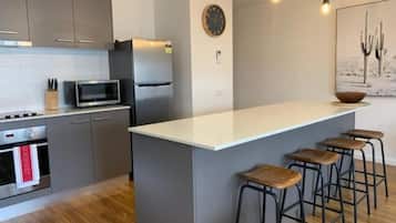 1st Floor Spa Deluxe | Private kitchen | Full-sized fridge, microwave, oven, stovetop