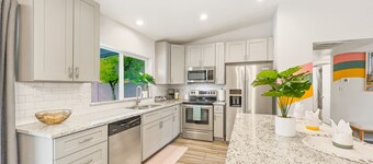 Heated Pool + Putting Green + 2 Car Garage