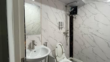 Basic Shared Dormitory, 1 Twin Bed | Bathroom | Shower, towels