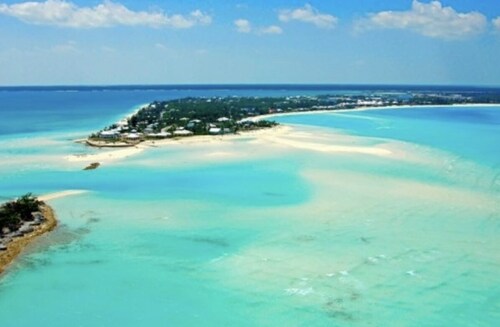 luxuries, leather couches, wine cooler, covered porch with a grill, free WiFi. 