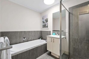 Shower, hair dryer, towels