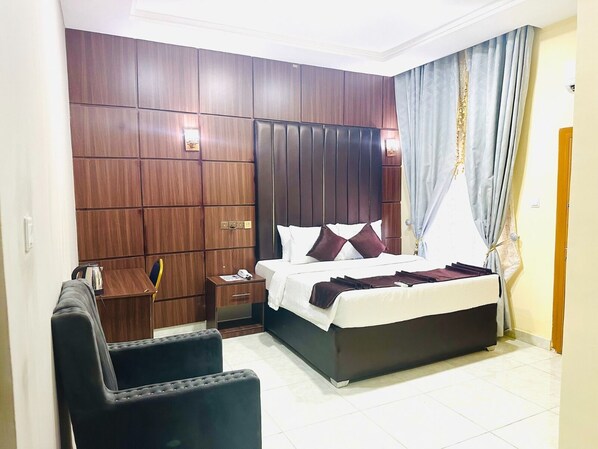 Standard Single Room | Bed sheets - Davina hill resorts and hotel (Abuja)