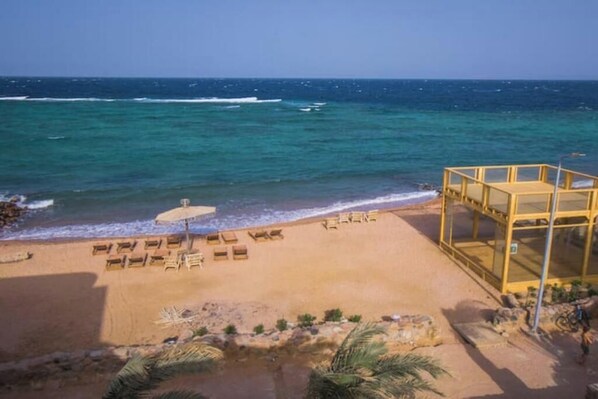 Solsenger og strandhåndklær