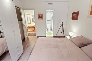 2 habitaciones, tabla de planchar con plancha y wifi gratis 