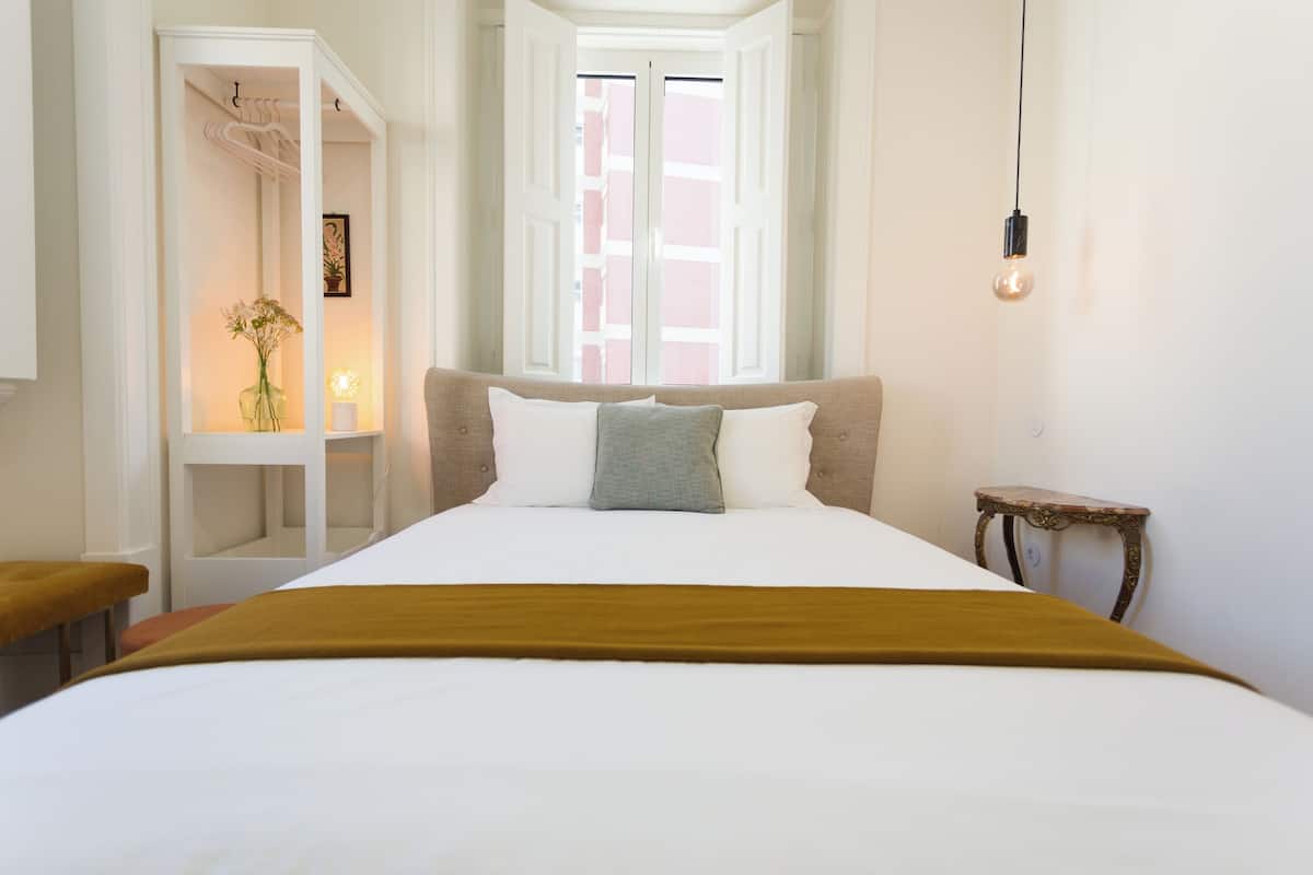 Tweepersoonskamer, uitzicht op stad | Luxe beddengoed, individueel gedecoreerd, individueel gemeubileerd