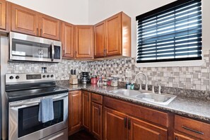 Fridge, microwave, oven, stovetop - Modern Mid-City Home | Mins - Superdome & Museums (New Orleans)