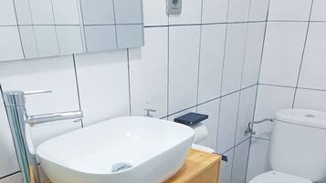 Hair dryer, towels, soap, toilet paper