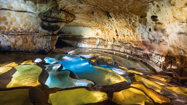 A cave interior with natural rock formations and a reflective water feature. - Lovely home in Saint-Nazaire (Saint-Nazaire)