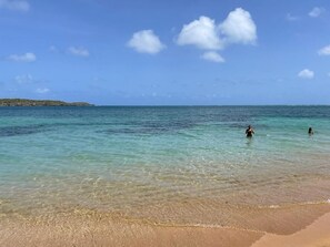 On the beach, sun-loungers, beach towels