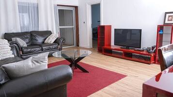 Apartamento de lujo | Zona de estar | Una Smart TV
