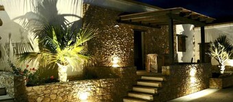 Exclusive residence consisting of 5 apartments with shared pool.