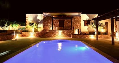 Exclusive residence consisting of 5 apartments with shared pool.