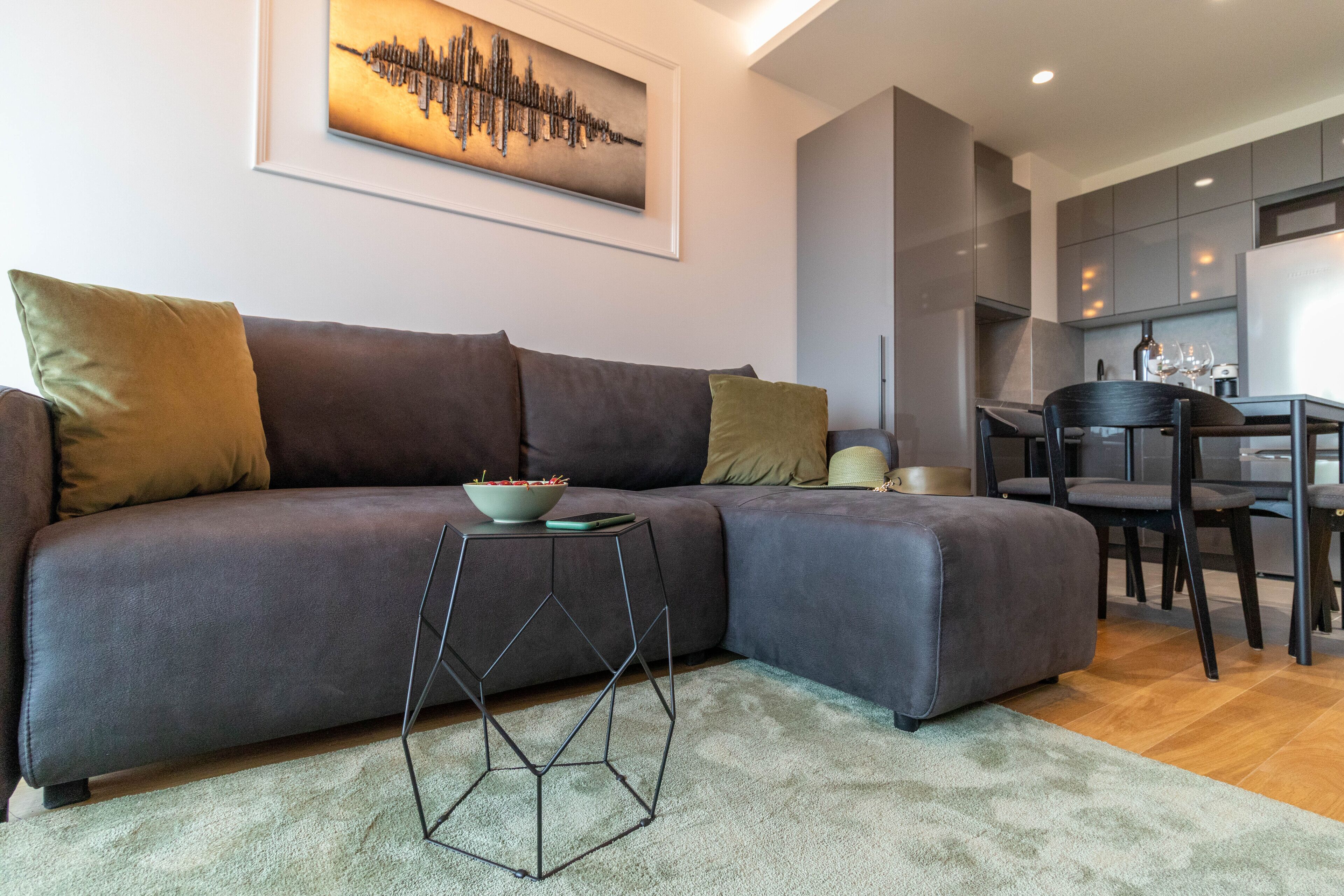 Exclusive Apartment | Living area | Flat-screen TV