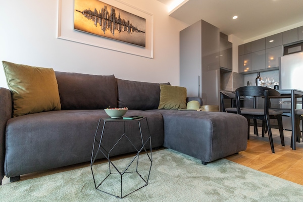 Exclusive Apartment | Living area | Flat-screen TV