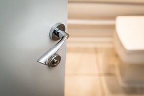 Shower, hair dryer, shampoo