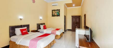 Kahden hengen deluxe-huone (kaksi sänkyä) | Työpöytä, vuodevaatteet