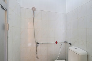Habitación Deluxe doble | Baño | Ducha y toallas