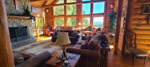 TV, fireplace, books - Experience Tranquility at Trinity Lodge, your Mountain Oasis in Leatherwood (Ferguson)