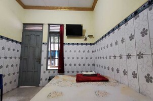 Espacio para trabajar con laptop, wifi gratis y ropa de cama 