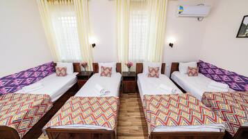 Standard Quadruple Room | Desk, laptop workspace, soundproofing, iron/ironing board