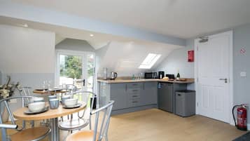 Fridge, microwave, toaster, cookware/dishes/utensils