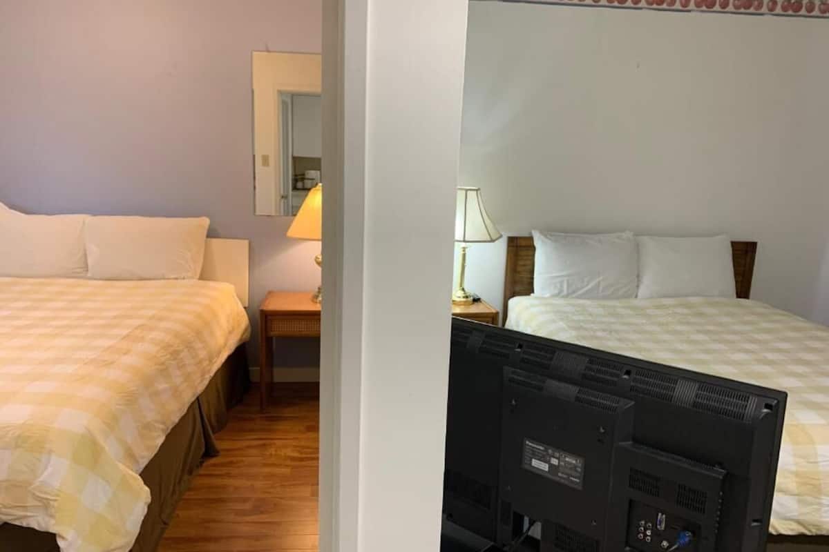 Suite Economy | 1 camera, biancheria da letto di alta qualità, Wi-Fi gratuito, lenzuola