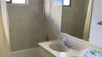 Hydromassage showerhead, hair dryer, towels, soap