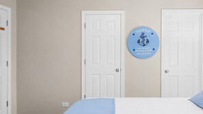 Closed closet door, tidied bed-11 - Charming apt in DT Libertyville - Near Naval Base (Libertyville)