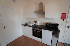 Apartemen Premium | Dapur pribadi | Lemari es, microwave, oven, dan kompor