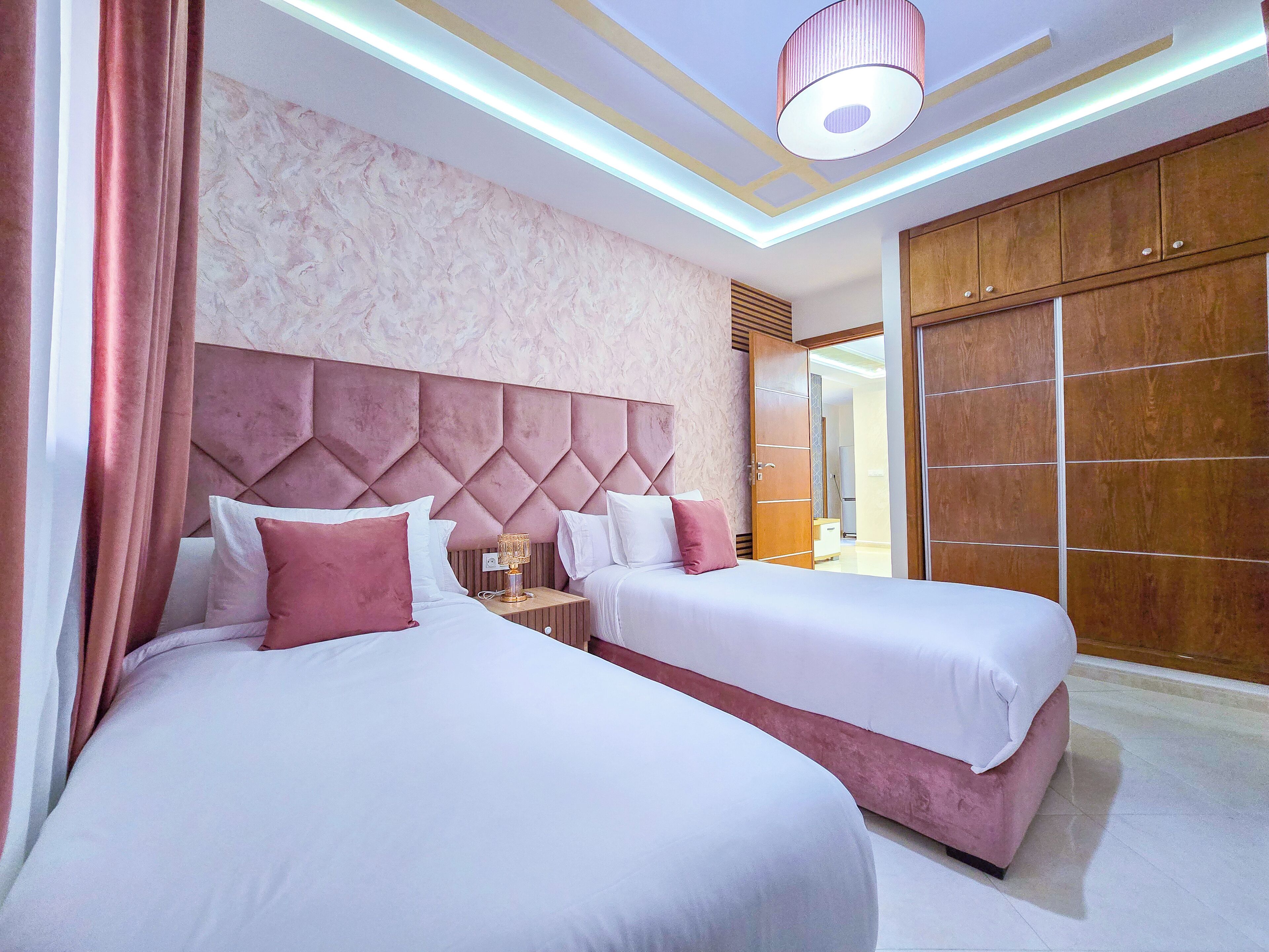 Elite Apartment | Select Comfort beds, individually decorated, iron/ironing board