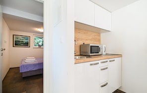 1 chambre, fer et planche à repasser, Wi-Fi gratuit, draps fournis