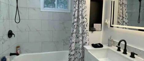 Hair dryer, towels, soap, shampoo