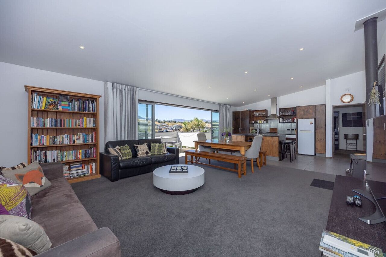 TV, fireplace, books