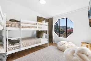 4 bedrooms, desk, iron/ironing board, travel cot
