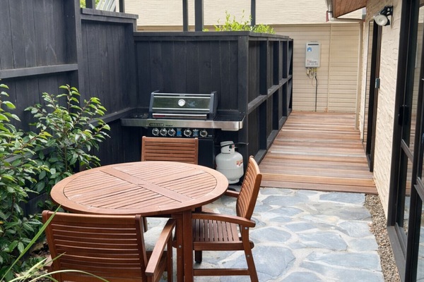 Outdoor BBQ and seating area