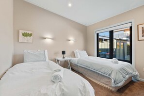 3 bedrooms, desk, iron/ironing board, travel cot