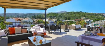 Renovated 2-Bed Gem in Kassiopi's Vibrant Tourist Village, WiFi, Terrace