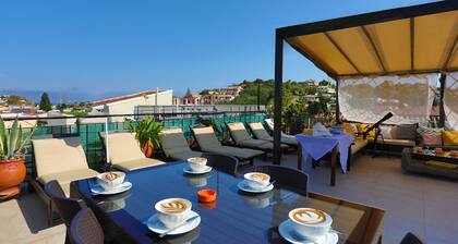 Renovated 2-Bed Gem in Kassiopi's Vibrant Tourist Village, WiFi, Terrace