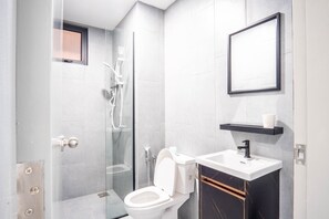 Deluxe Apartment | Bathroom | Shower, rainfall showerhead, hair dryer, bidet - M Vertica KL by Airhost  (Kuala Lumpur)