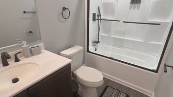 Hair dryer, towels, soap, shampoo