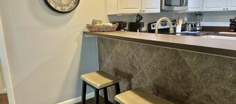 Spacious Corner Unit – 3BR Ground-Floor Condo w/ 2 Patios, Smart TVs & Scenic Pond Views