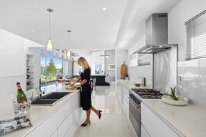 Private kitchen - Luxury Villas Bluewater at Forresters (w/ heated rooftop spa) (Central Coast)